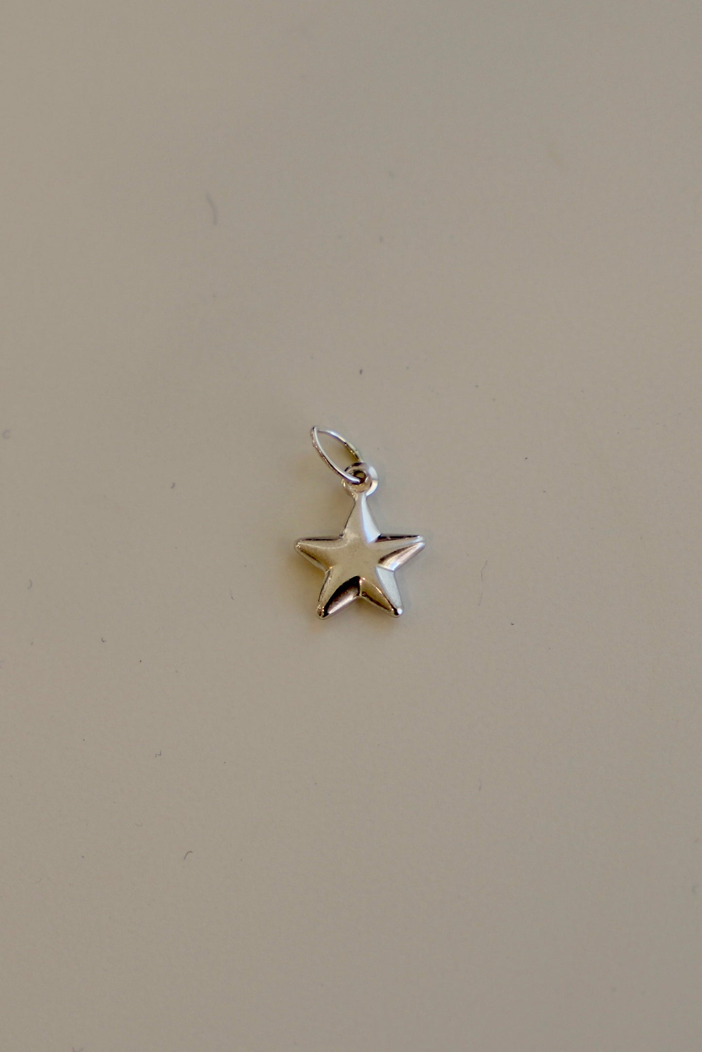 SILVER STAR CHARM
